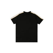 Back of black T-Shirt with White Banda down the tops of each sleeve.