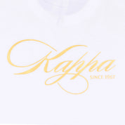 White t-shirt with Kappa lettering in rich gold yellow. Detail view.