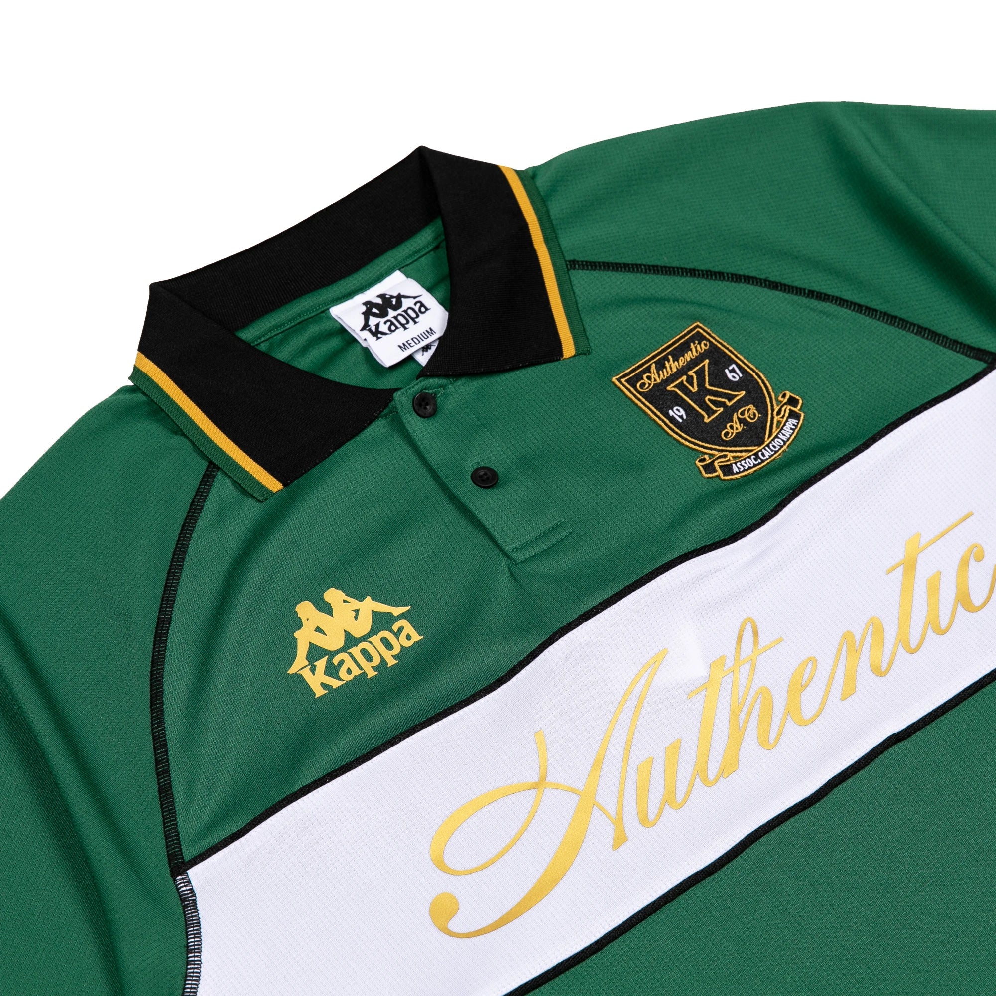 Green Polo with black, white, and gold detailing. Front reads Authentic with Kappa logos.