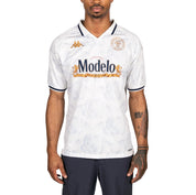 Male model wearing Kombat 2025 Modelo Soccer Jersey in white. Front view.