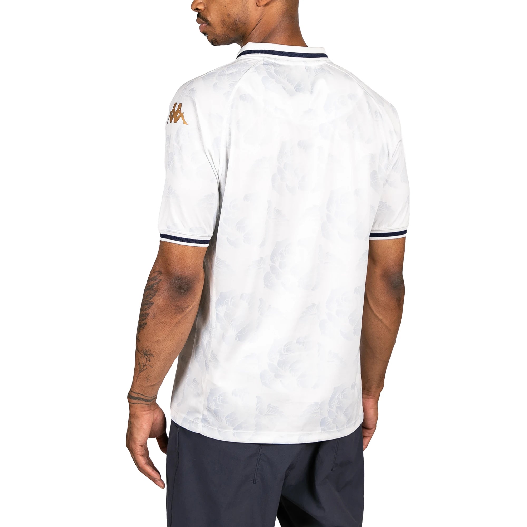 Male model wearing Kombat 2025 Modelo Soccer Jersey in white. Back view.