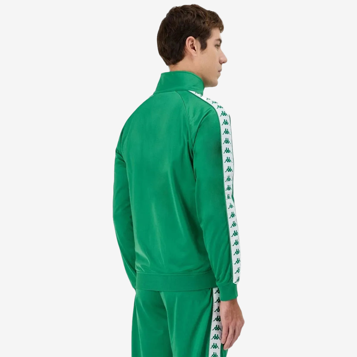 #color_green
Man wearing green Kappa track jacket with white and green banda going down the arms and Omini logo in white on left side. Back view.
