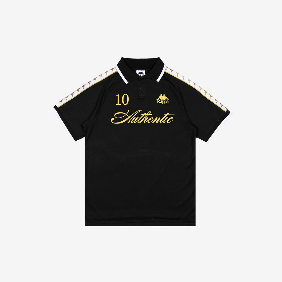 Black polo with white banda down the tops of each sleeve. Front reads Authentic, the number 10, and the Kappa logo in golden yellow.