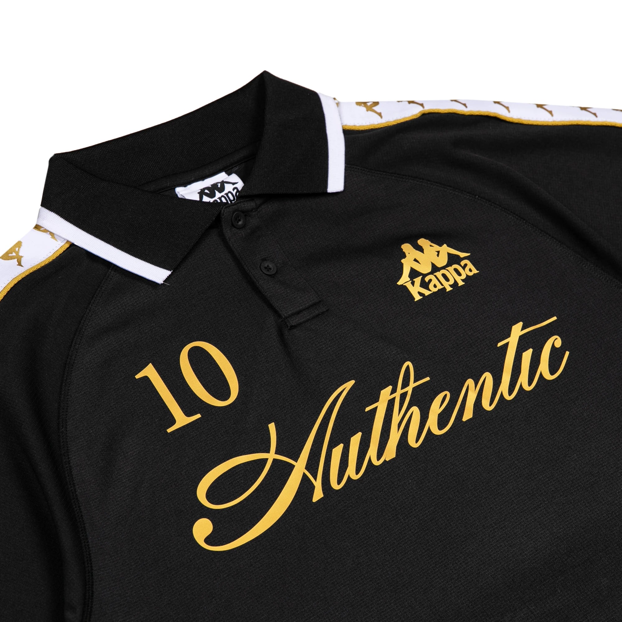 Black polo with white banda down the tops of each sleeve. Front reads Authentic, the number 10, and the Kappa logo in golden yellow.