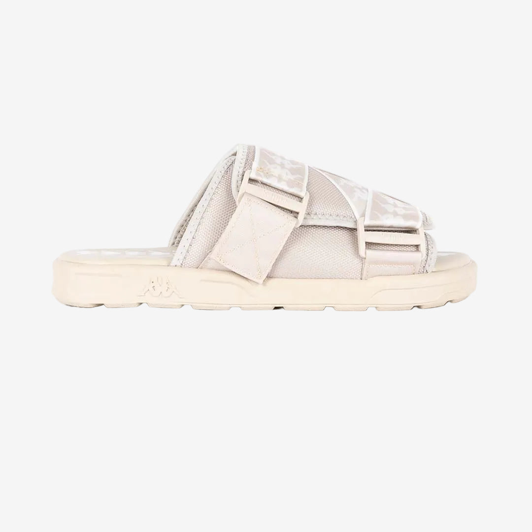 Beige sandal with mesh design on a white background