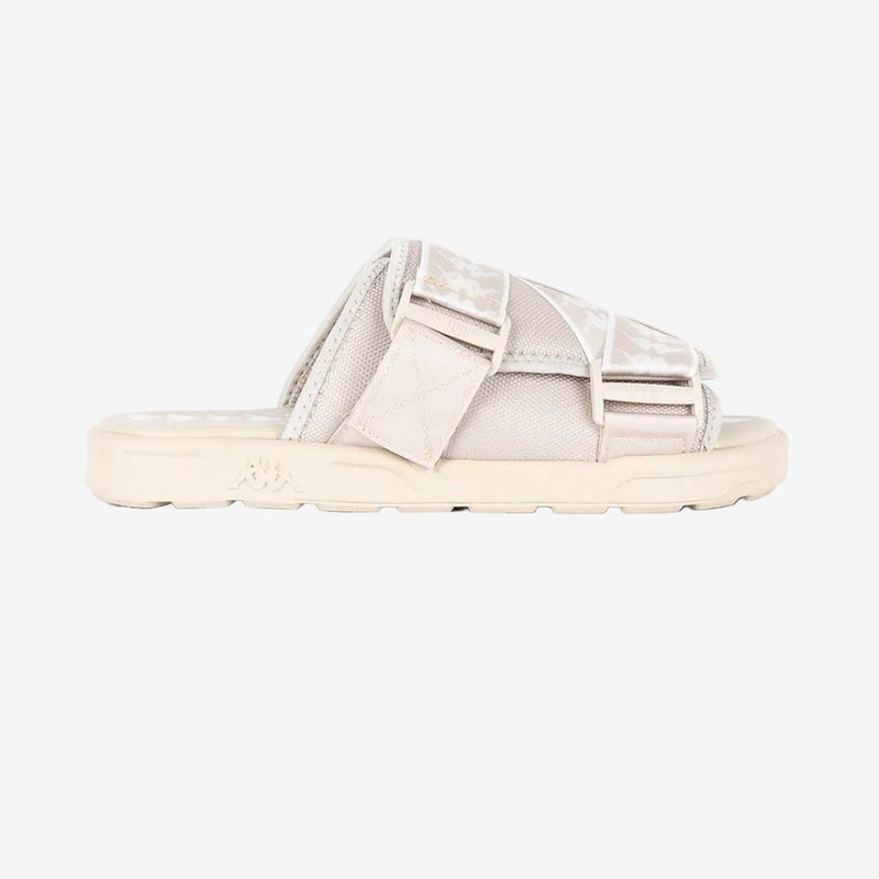 Beige sandal with mesh design on a white background