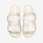 Beige sandals with mesh design on a white background