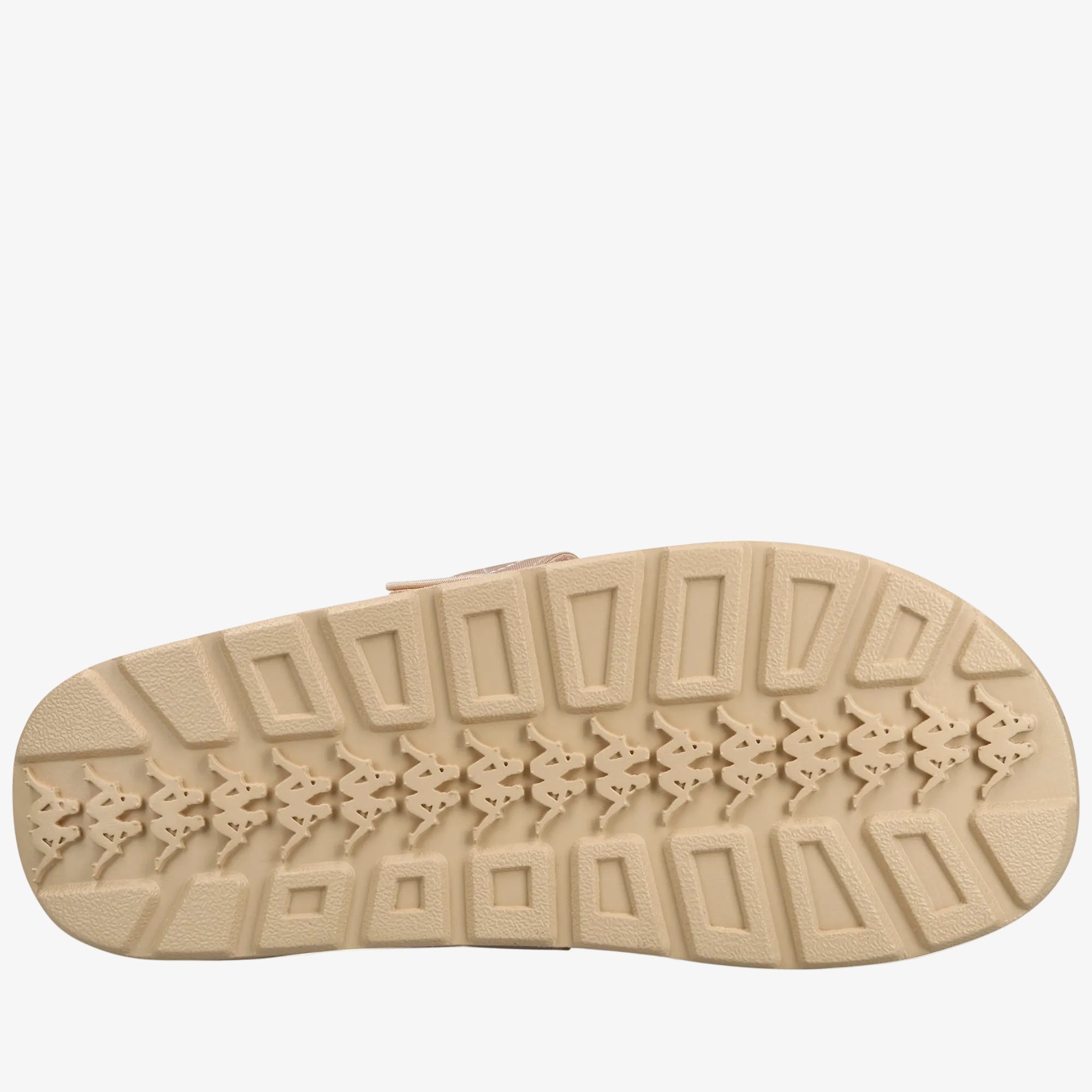 A close-up, top-down view of a beige textured rubber outsole, showing a pattern of rectangular blocks and repeating bunny motifs, on a solid white background.