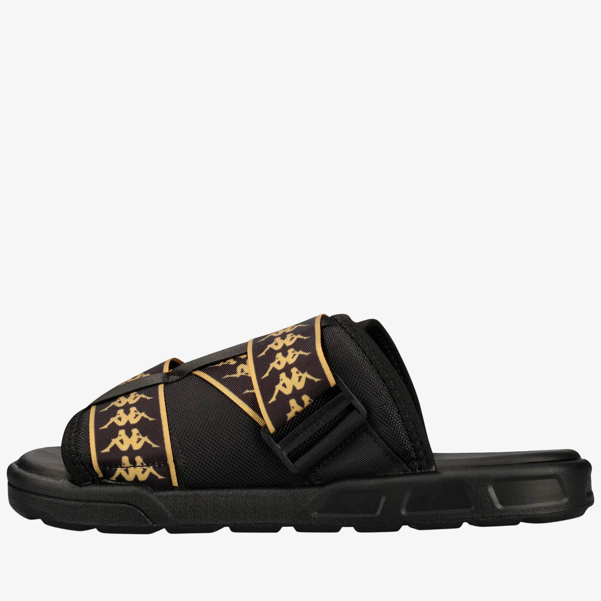 A black Kappa slide sandal with gold logo patterns on the straps, shown in a side profile view against a white background.