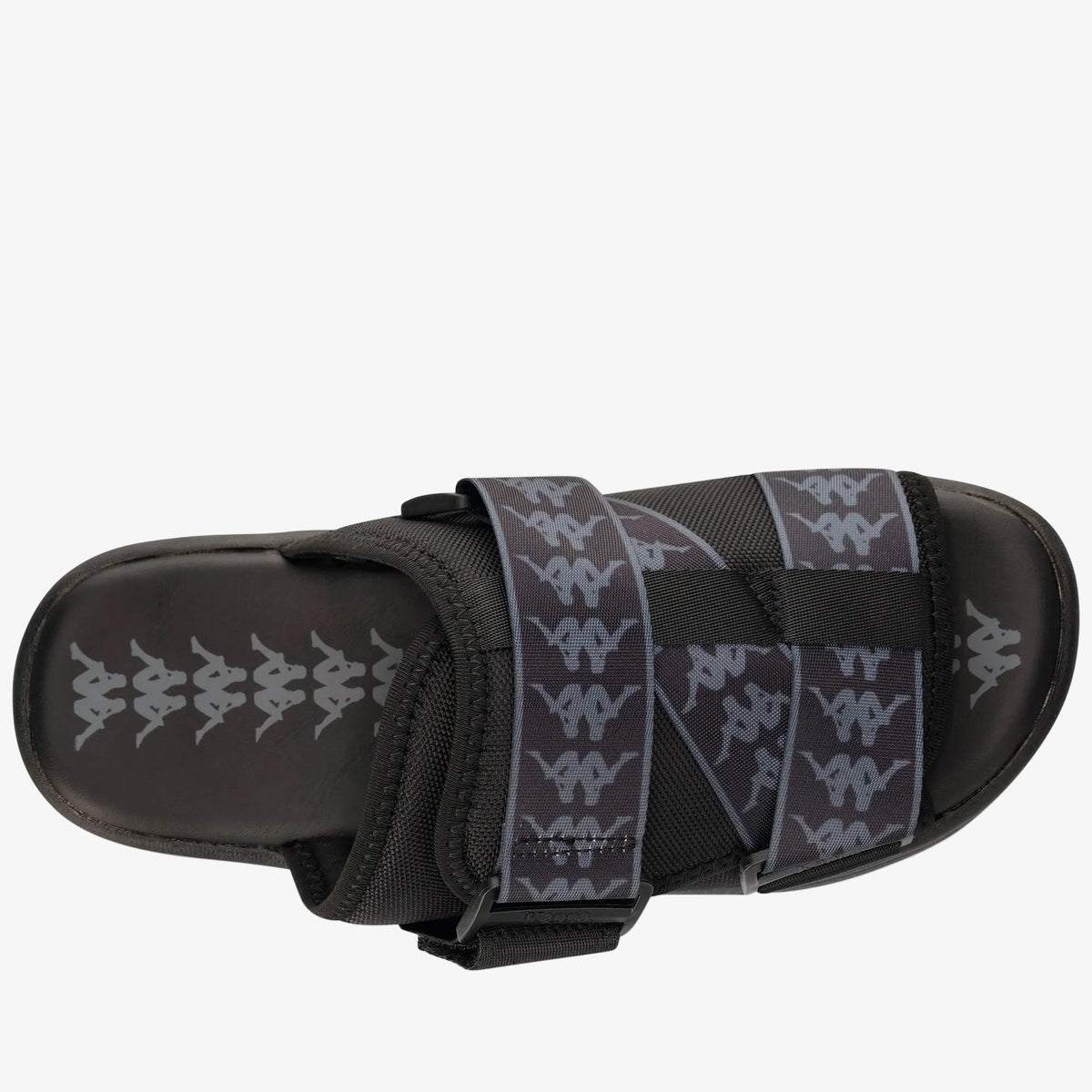 Black sandal with strap design on a white background