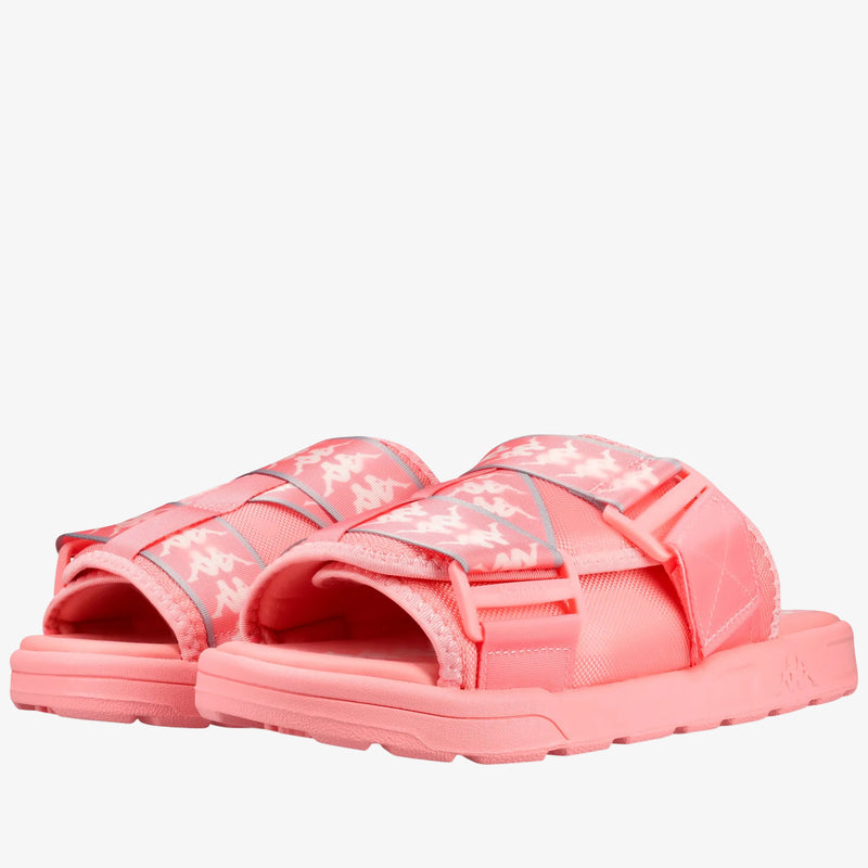A pair of coral pink slide sandals with reflective silver straps and a textured sole, shown on a clean white background.