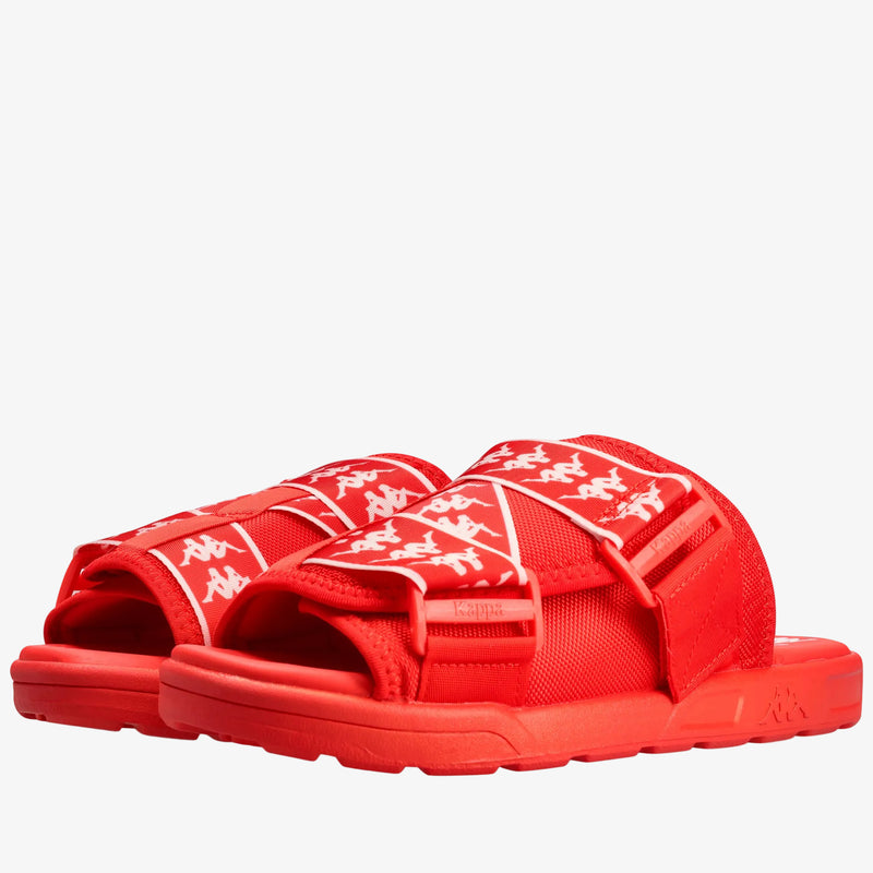 A pair of red slide sandals with white Kappa logo patterns on the straps, shown against a plain white background.