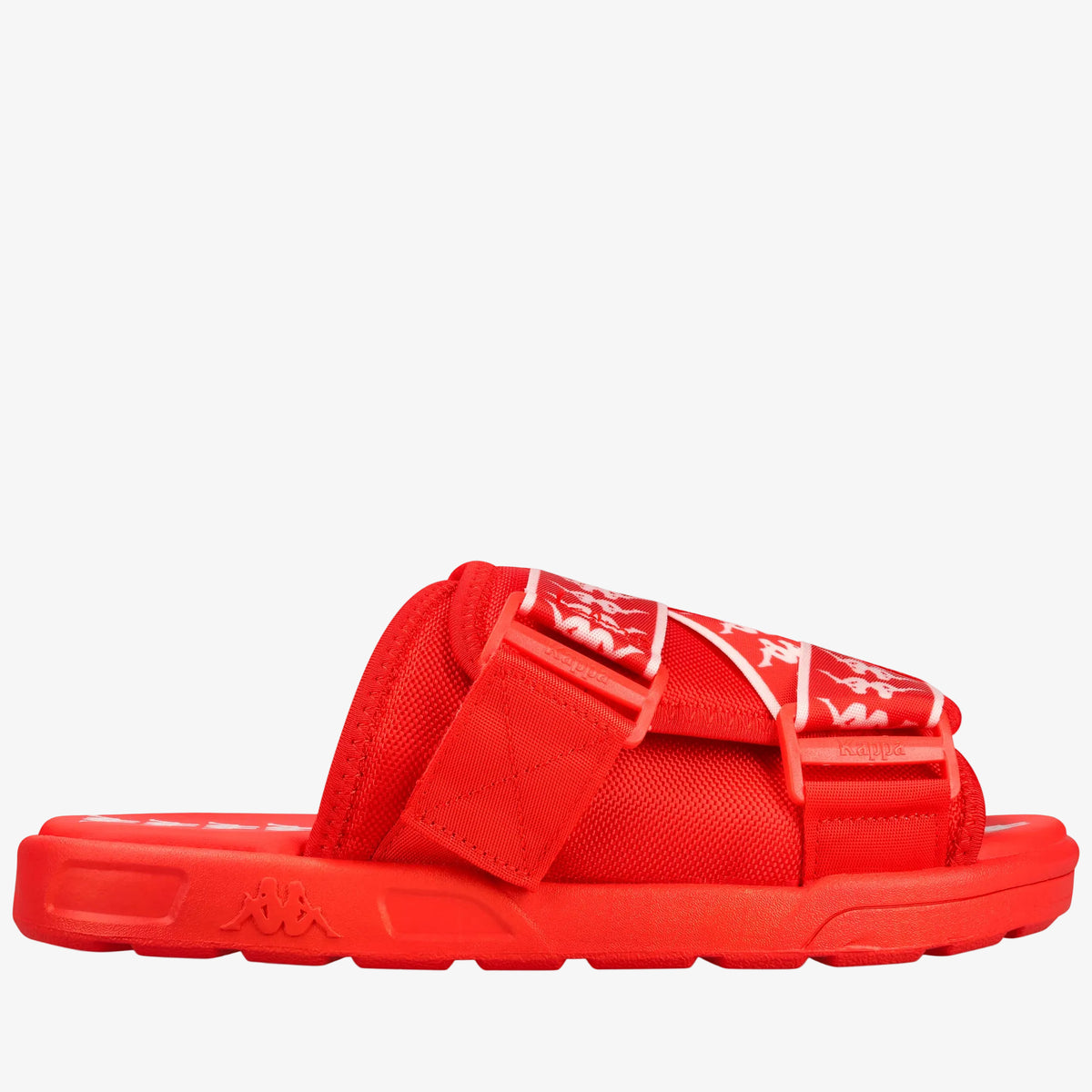 A bright red slide sandal with a wide adjustable strap featuring a white graphic pattern, set against a plain white background.