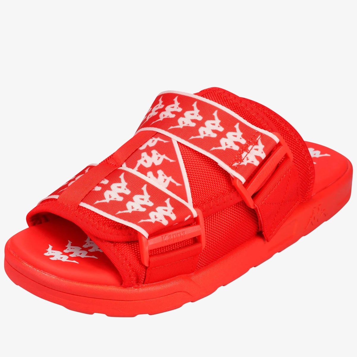 A red slide sandal with white Kappa logos printed across the straps and on the footbed, shown on a clean white background.
