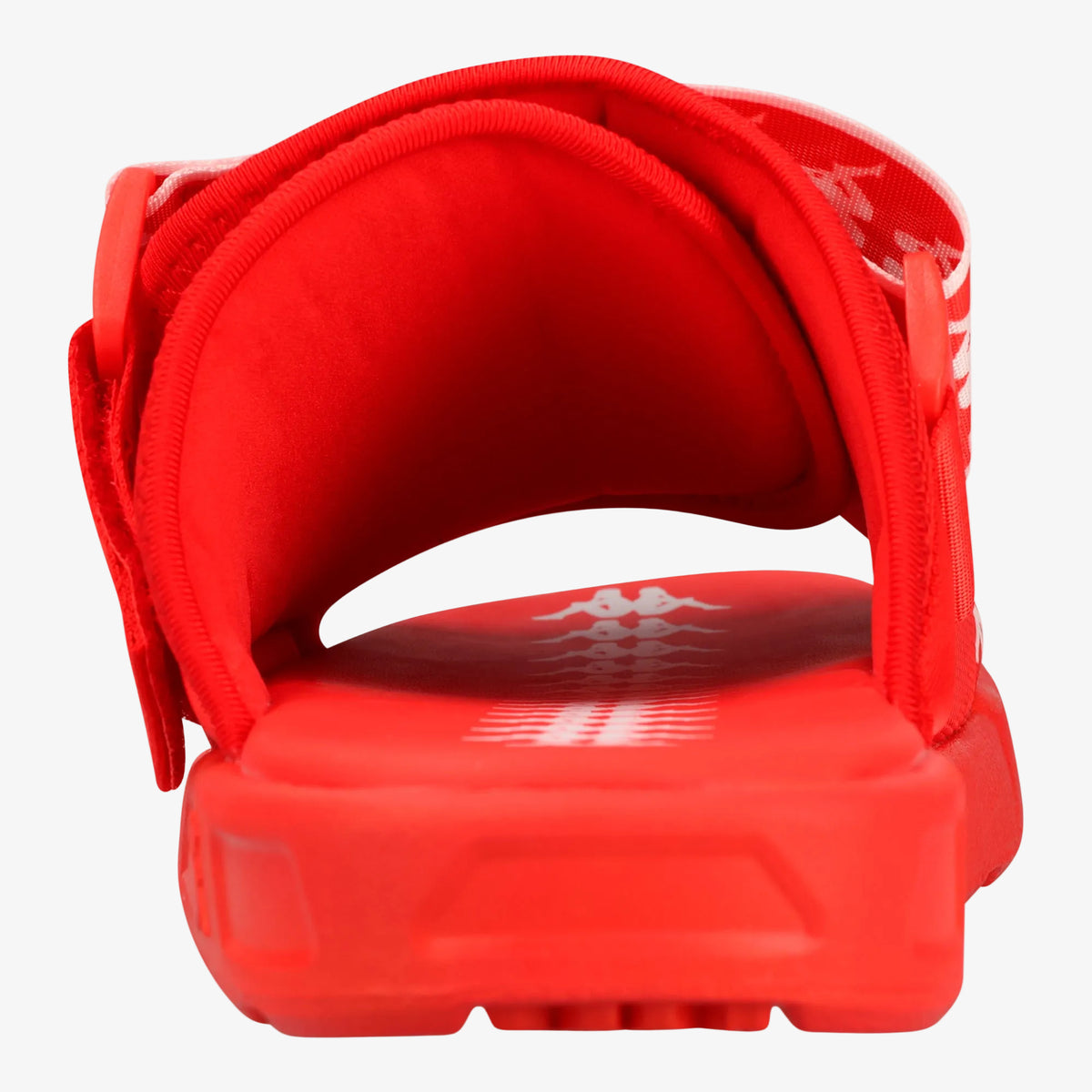A close-up rear view of a red slide sandal, showing the padded footbed, strap, and textured sole against a white background.