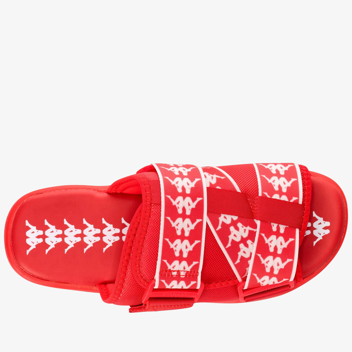 A red slide sandal featuring multiple wide straps with a repeating white Kappa logo pattern, set against a plain white background.