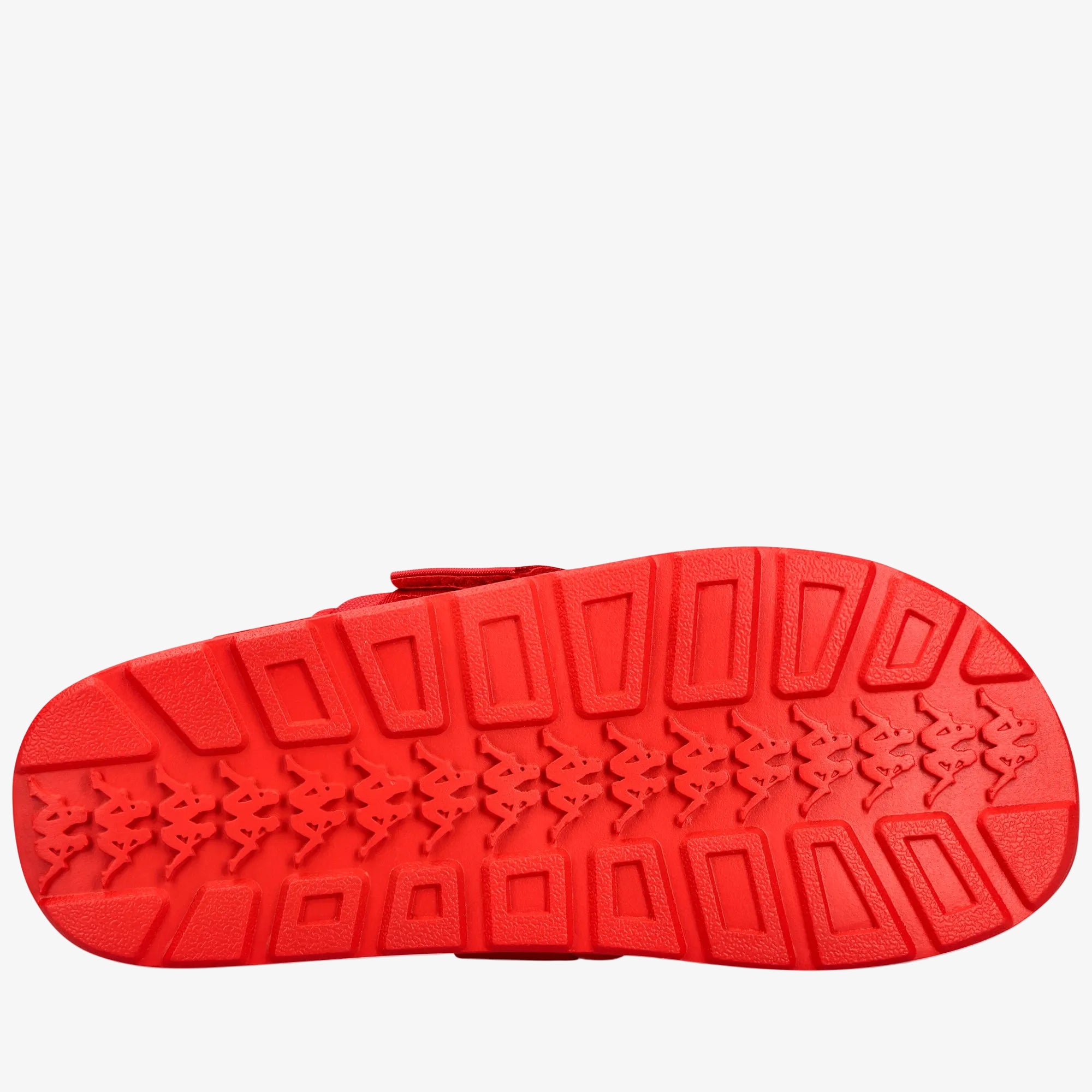 A bright red shoe sole with a textured tread pattern and repeating Kappa logo, shown against a plain white background.