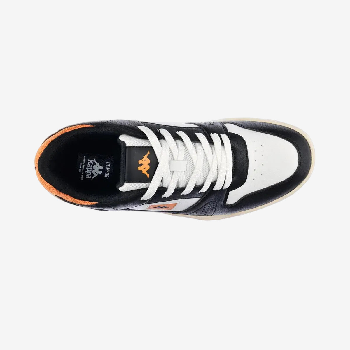 Black and white sneaker with orange accents on a white background