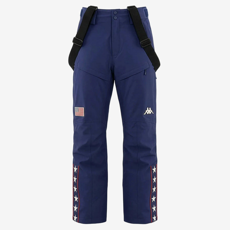 Blue snow pants with suspenders and star designs on a white background