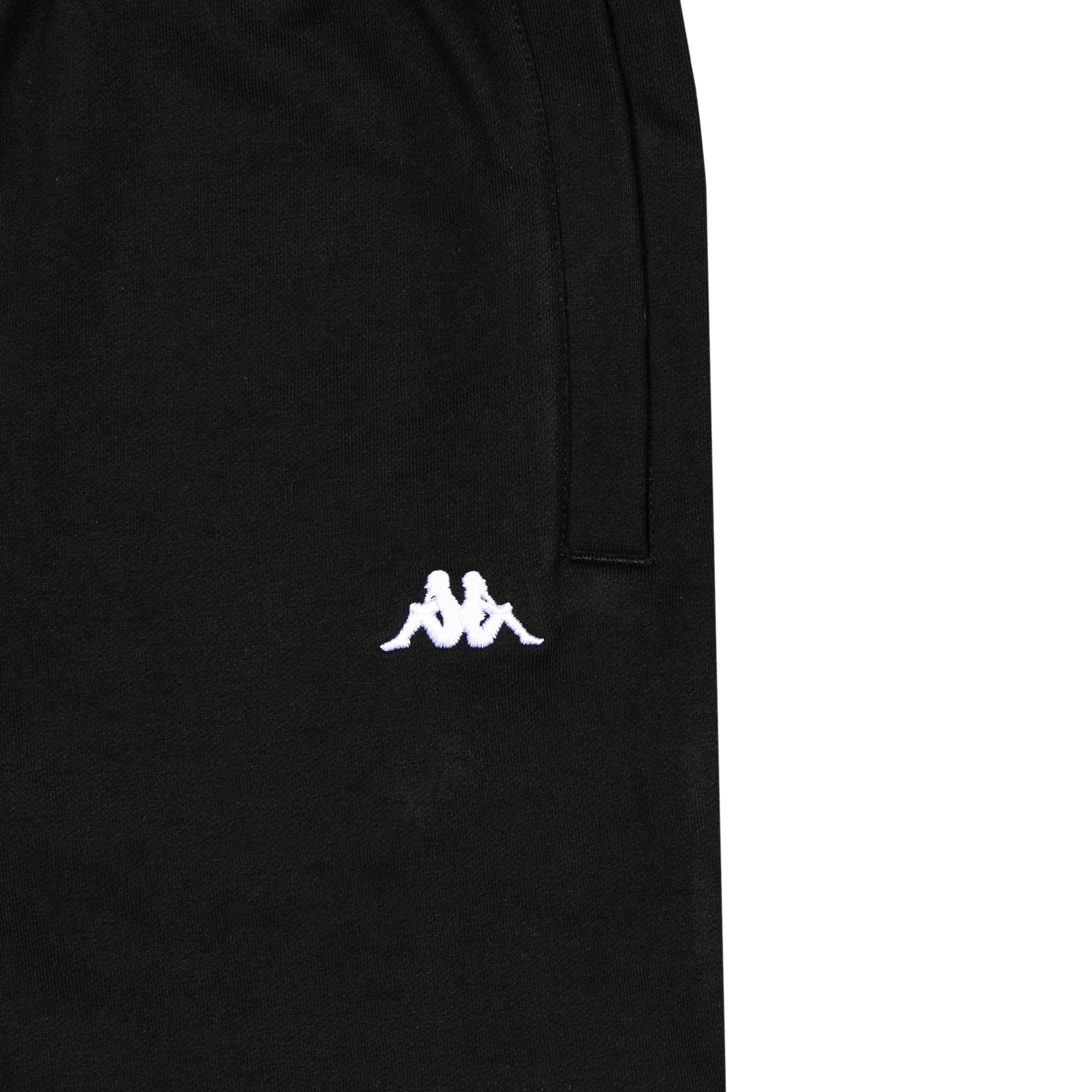 Detail view of white embroidered Kappa Omini logo on black shorts.