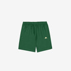 Green shorts with golden yellow Kappa Omini logo on left leg.