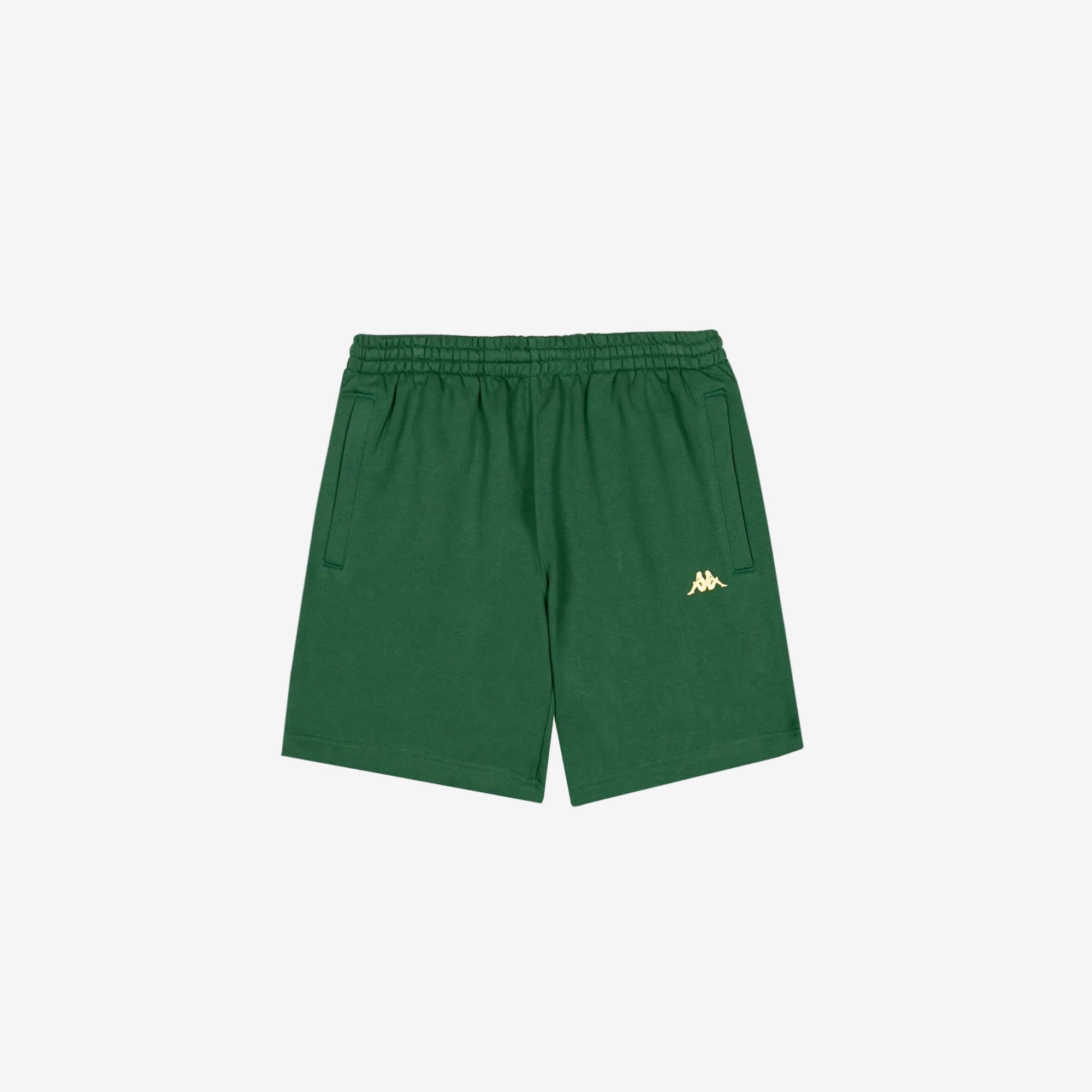 Green shorts with golden yellow Kappa Omini logo on left leg.