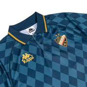 Blue checkered polo with gold detailing with golden Kappa logo and crest.