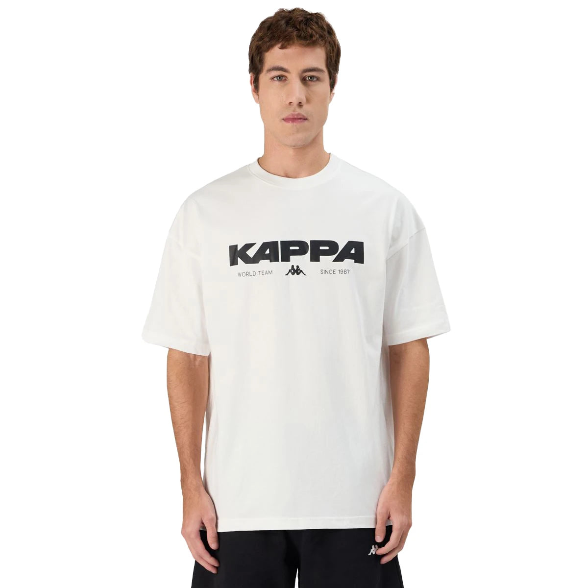 Man wearing Kappa Authentic Nhisso T-Shirt in White. Front view.