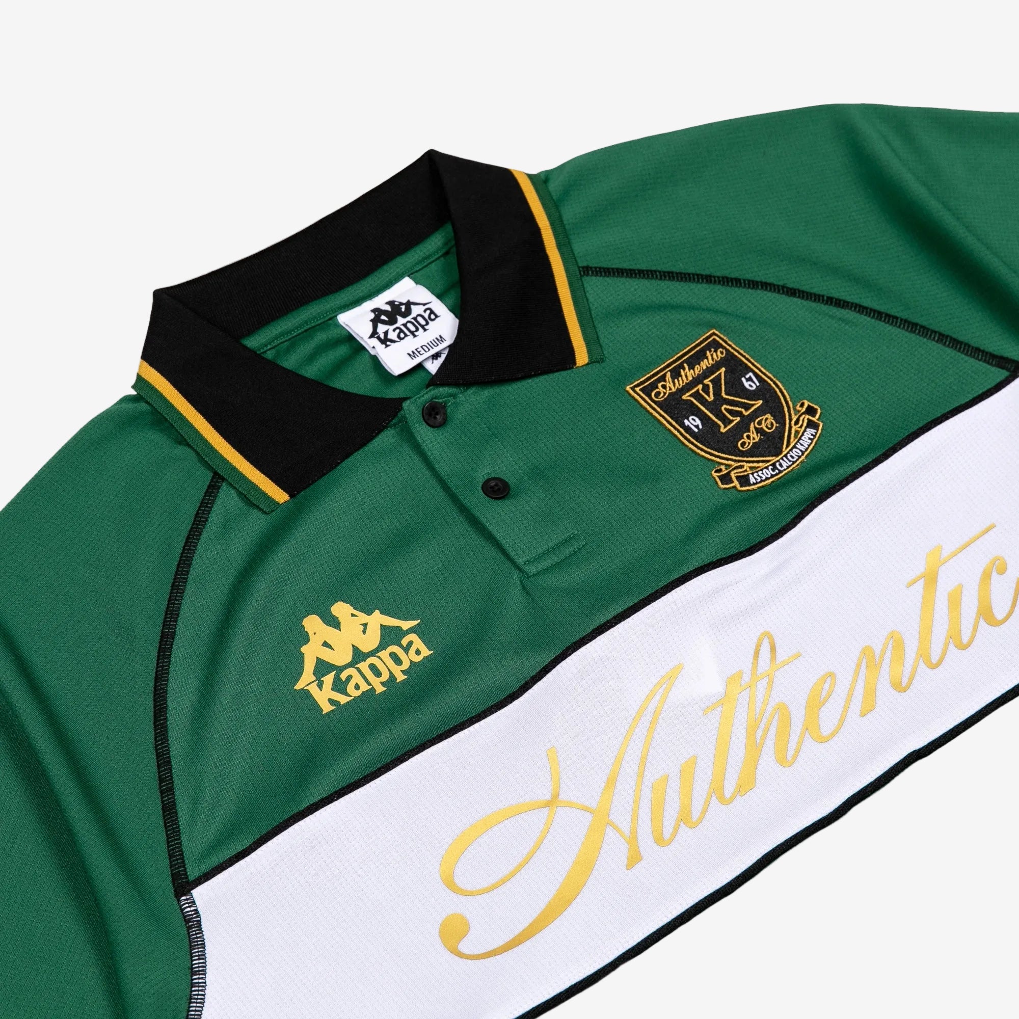 Green Polo with black, white, and gold detailing. Front reads Authentic with Kappa logos.