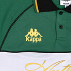 Detail view of gold Kappa logo.