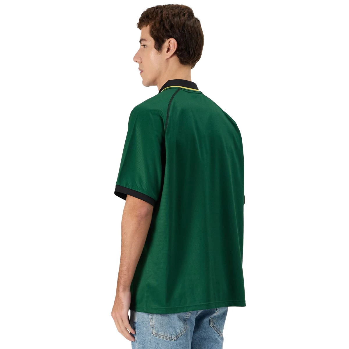 Man wearing Kappa Authentic Norton Polo in Green Eden. View from back.