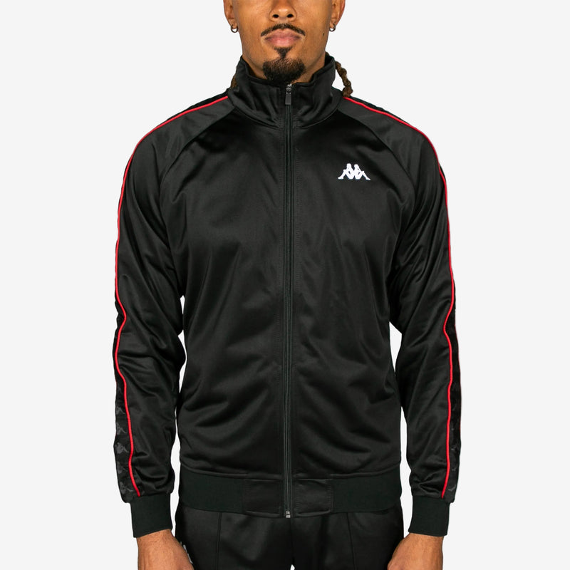 Black tracksuit with red accents on a white background
