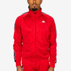 Person wearing a red tracksuit with a brand logo on a white background