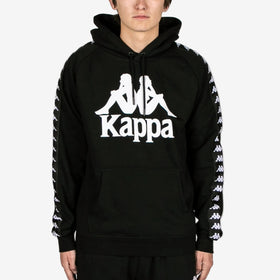 Person wearing a black hoodie with Kappa logo on a white background