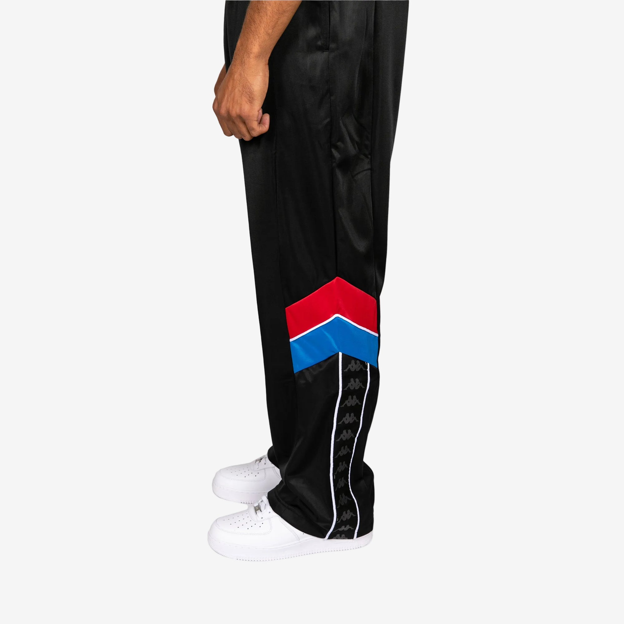 Black track pants with a colorful logo on a white background