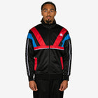 Man wearing a black tracksuit with red and blue accents on a white background