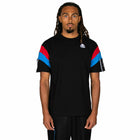 Person wearing a black t-shirt with colorful sleeves on a white background