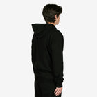 Person wearing a black hoodie from behind on a white background