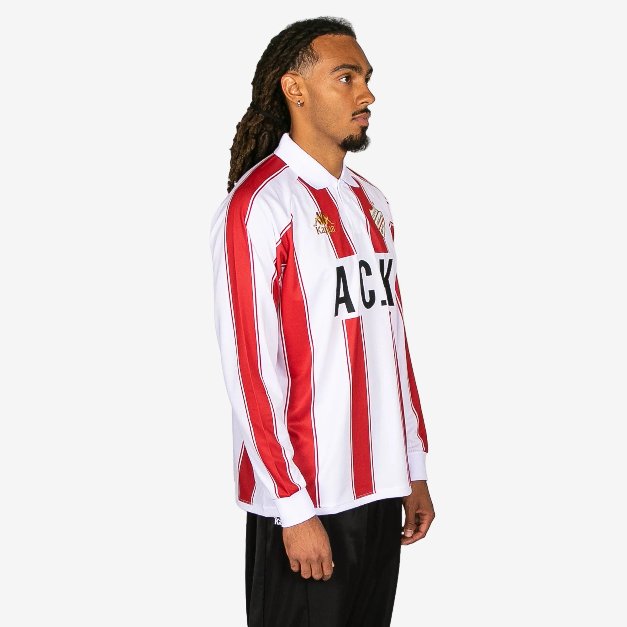 Person wearing a red and white striped shirt with 'ACK' on a white background