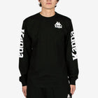 Person wearing a black long-sleeve shirt with Kappa branding on a white background