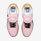 Pink sneakers with black laces and a visible brand logo on a white background