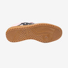 Sole of a sneaker with a brand logo on a white background