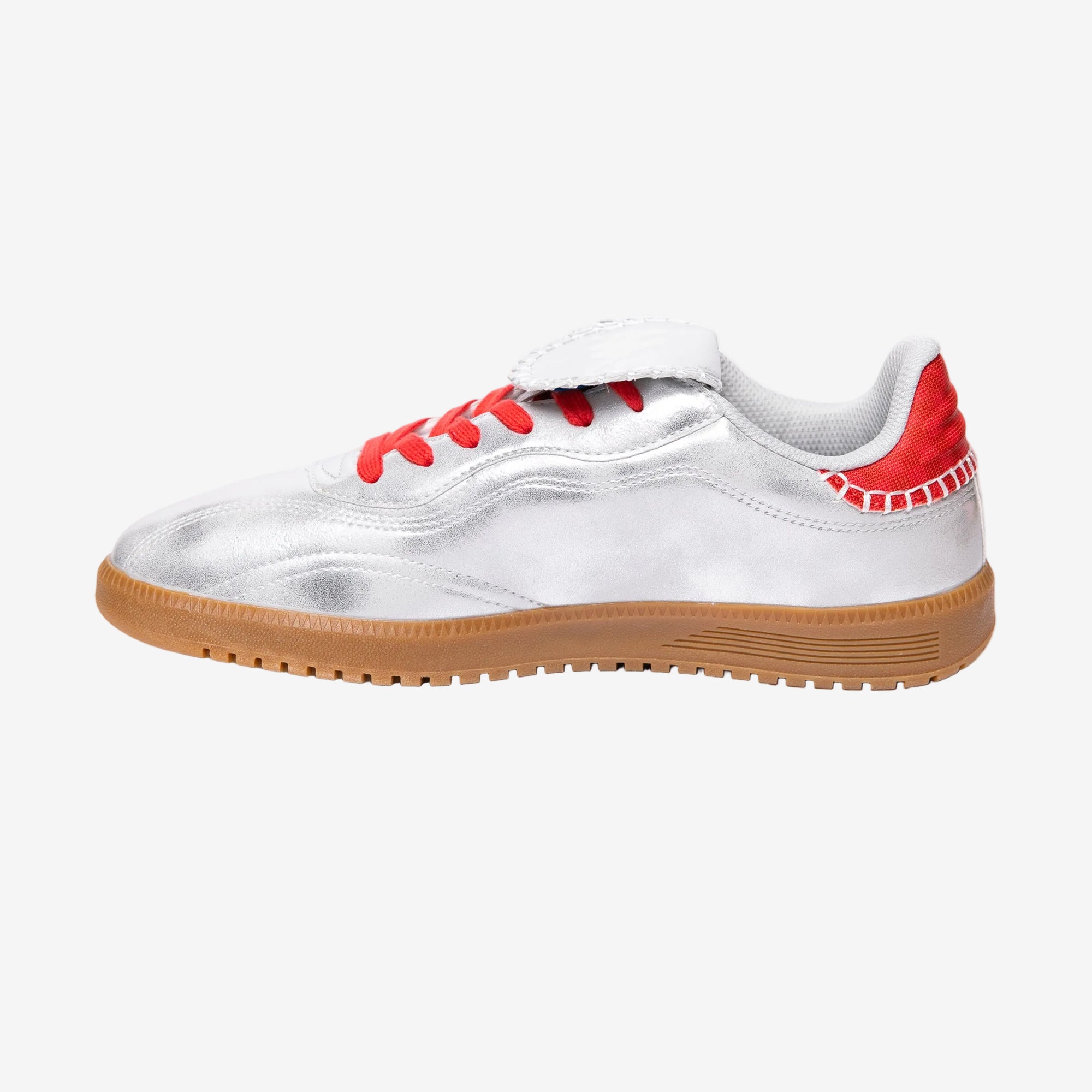 White sneaker with red accents on a white background