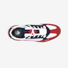 Top view of a red, white, and blue sneaker on a white background.