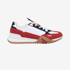 A pair of Kappa Authentic Arklow 1 sneakers in white, blue, and red colors with a rubber outsole.