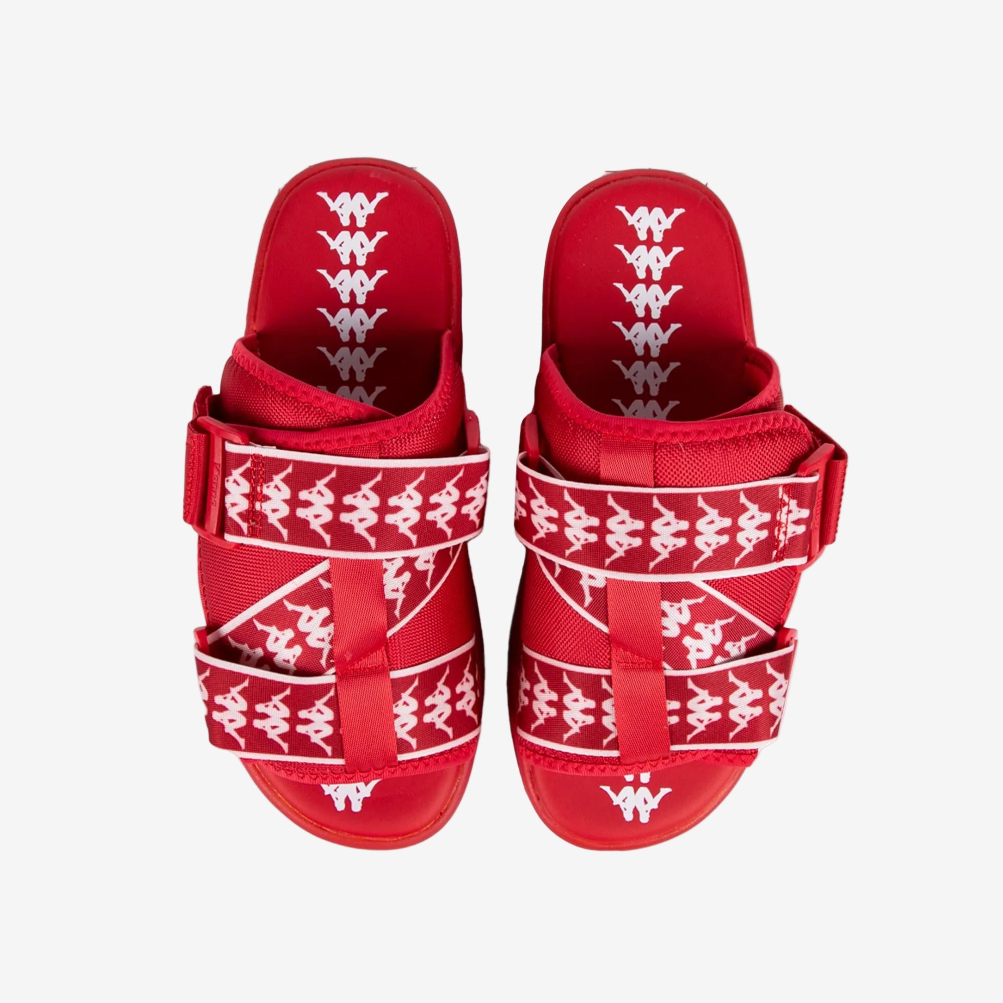 Red sandals with white patterns on a white background