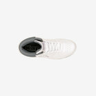 White sneaker with gray sole on a white background