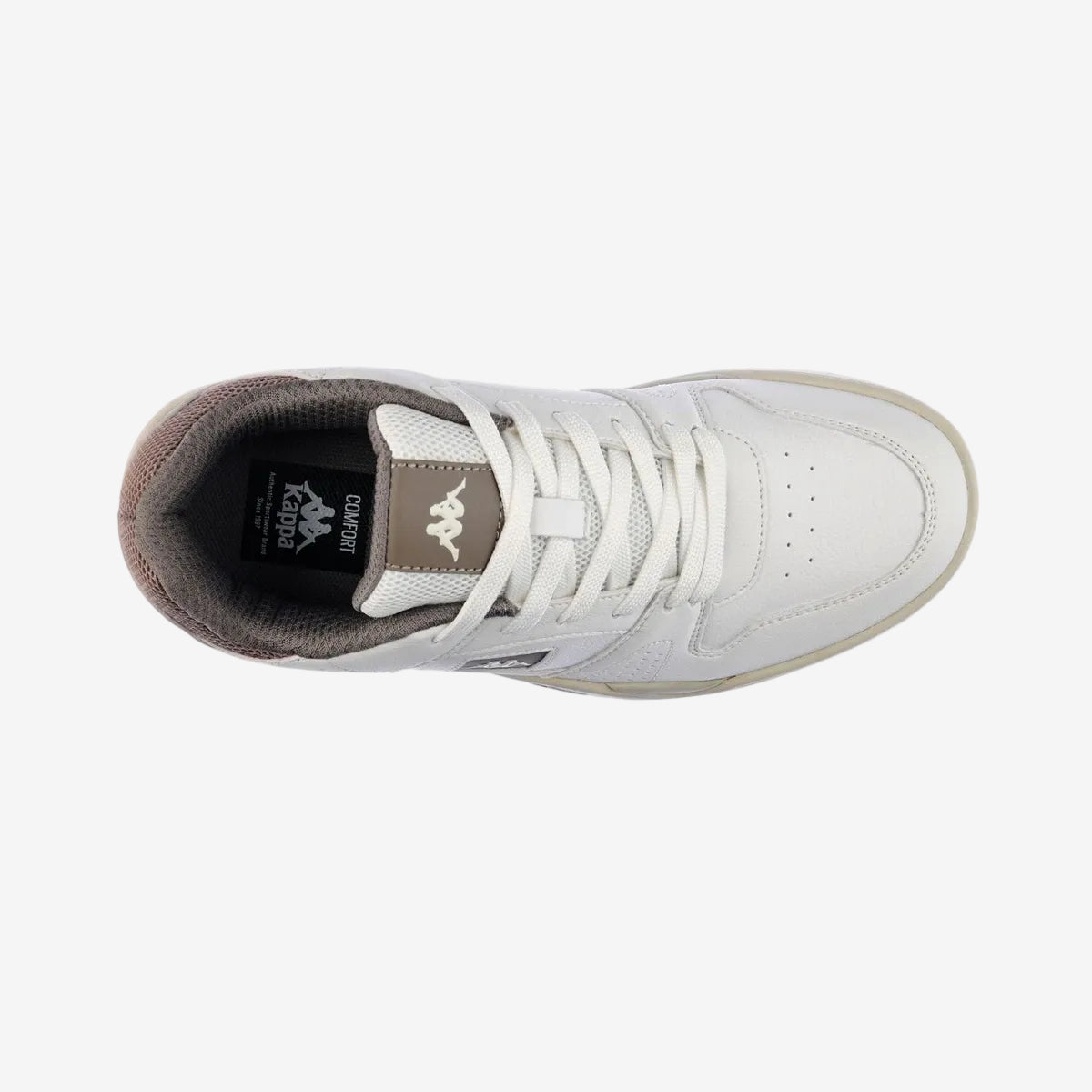 White sneaker with brown sole on a white background