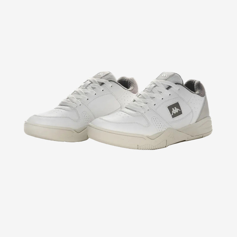 White sneakers with a logo on a white background