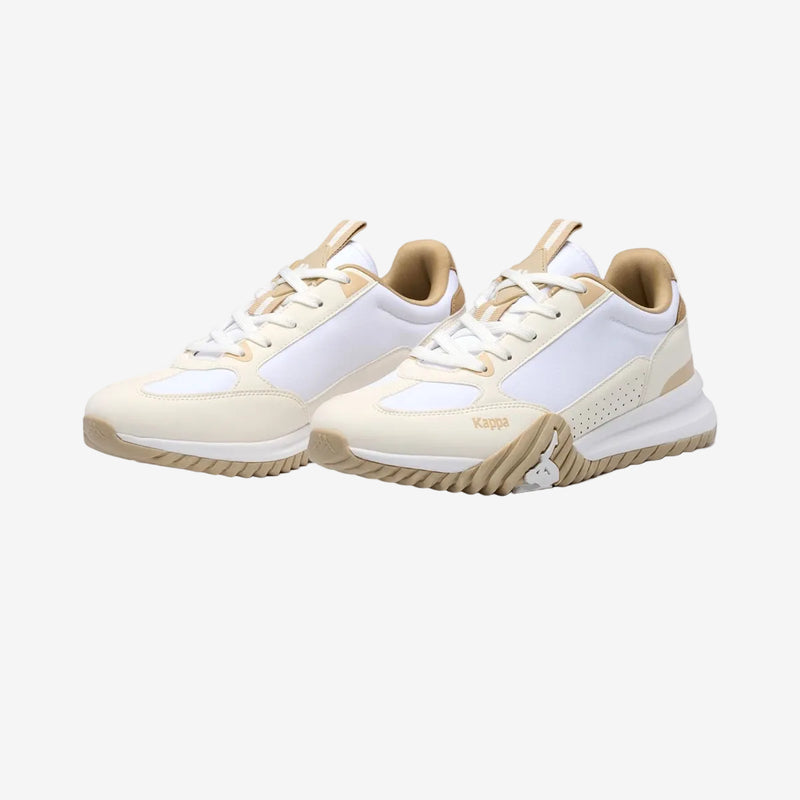 Pair of beige and white sneakers on a white background